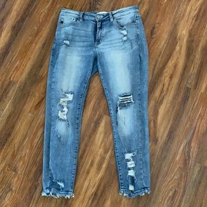 KanCan heavy distressed low-mid rise jeans.